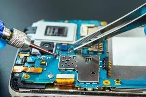 repairing-and-upgrade-mobile-phone-electronic-computer-hardware-and-technology-concept-photo